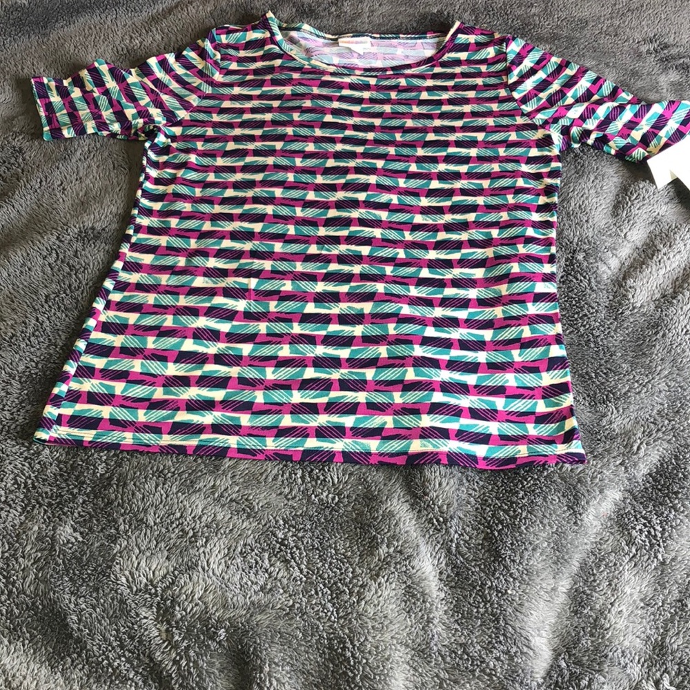 LuLuRoe girls blouse size L.